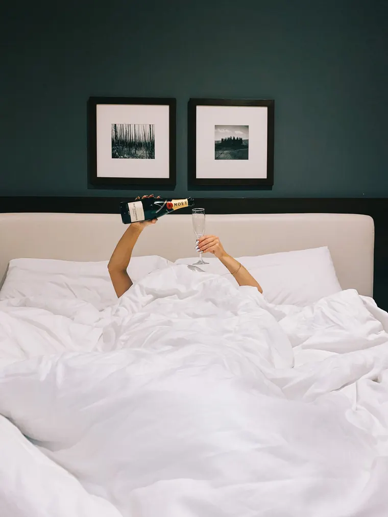 Someone toasting from under the covers the morning after